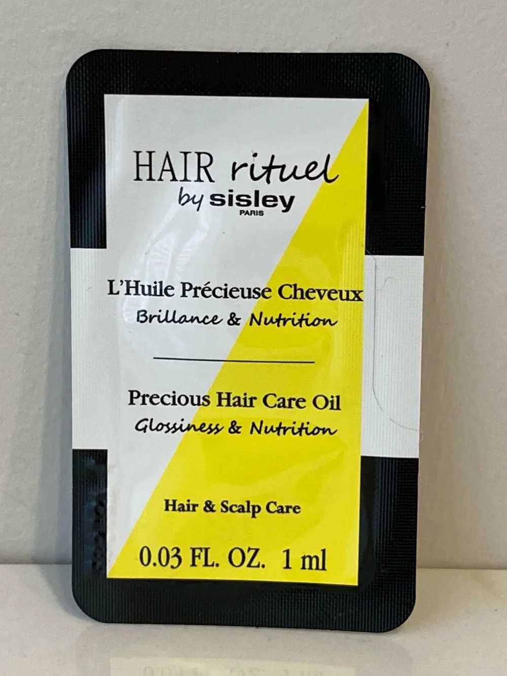 5/$25 Sisley Hair Rituel Precious Hair Care Oil 1ml